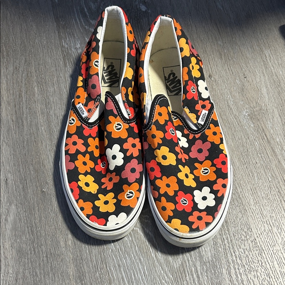 Vans Classic Slip-On sneakers in the Flower Black/Multi colorway